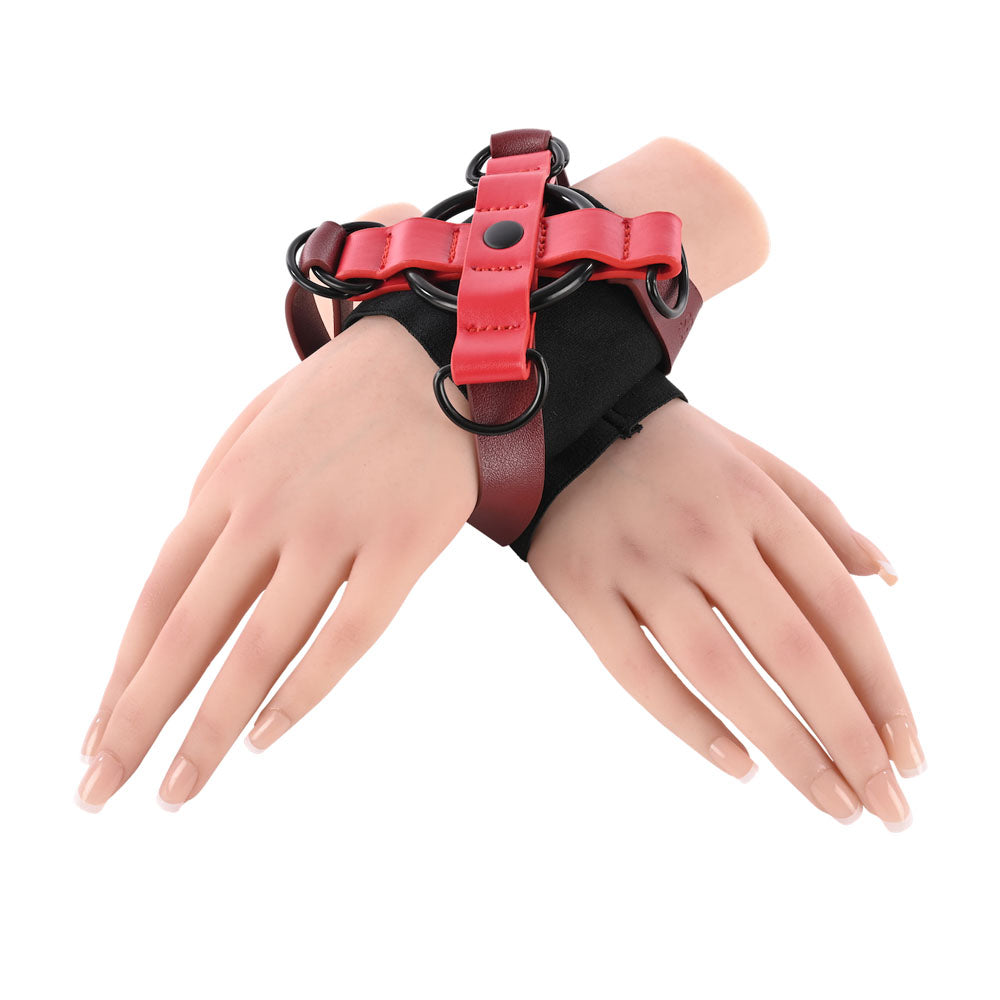 S&M Exs & Ohs Cross Cuffs